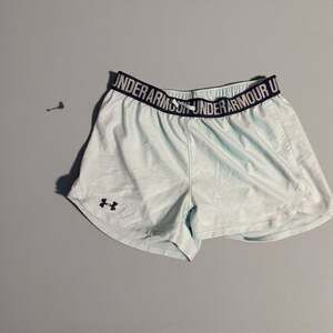 Under Armour Women's Play Up 3.0 Side Mesh Shorts in Turquoise